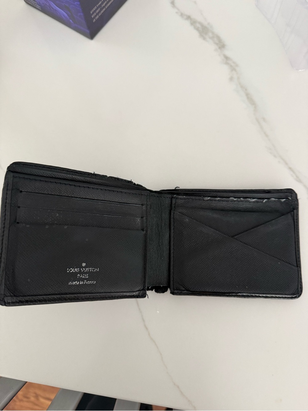 Louis Vuitton Black Bi Fold wallet in Taiga leather